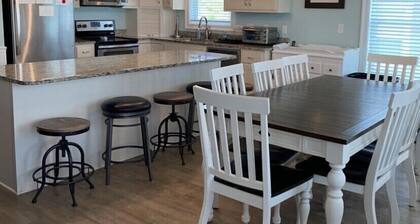Amazing sunsets and ocean breezes await you at this beautiful beach view home.