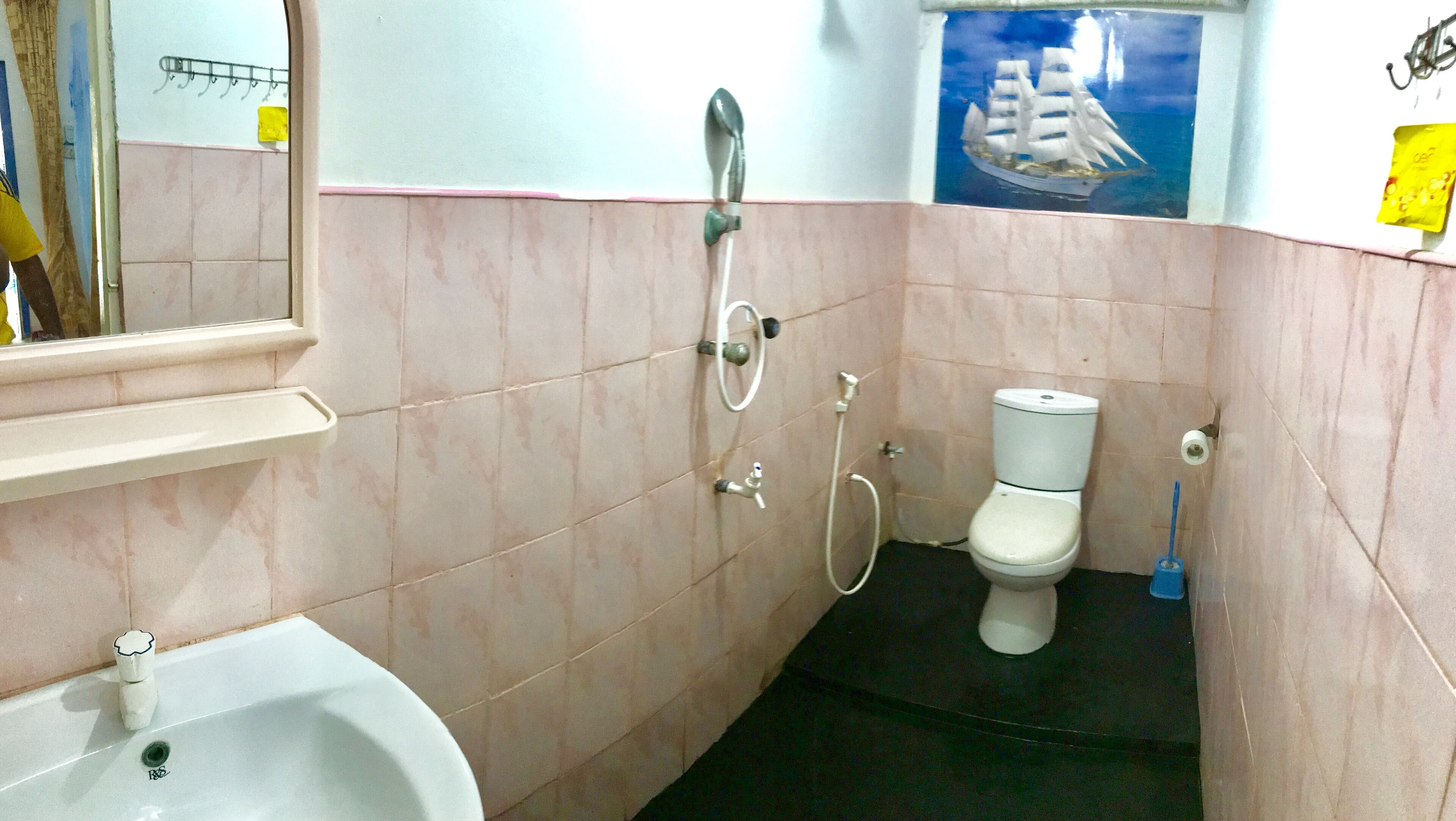 Separate bathtub and shower, free toiletries, hair dryer, slippers