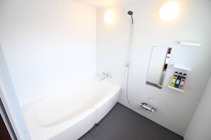 Deluxe-Apartment | Badezimmer