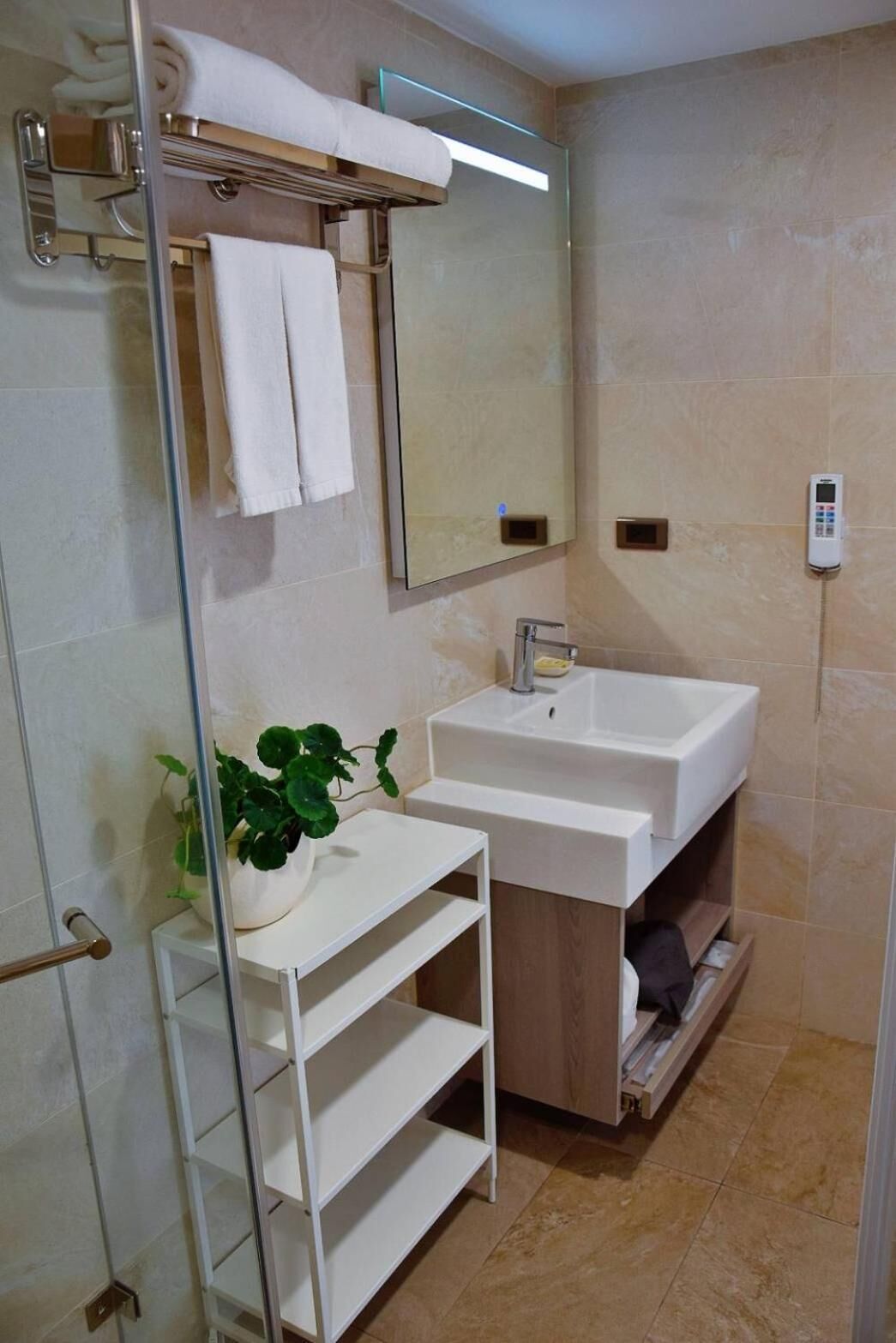 eco-friendly toiletries, hair dryer, slippers, towels