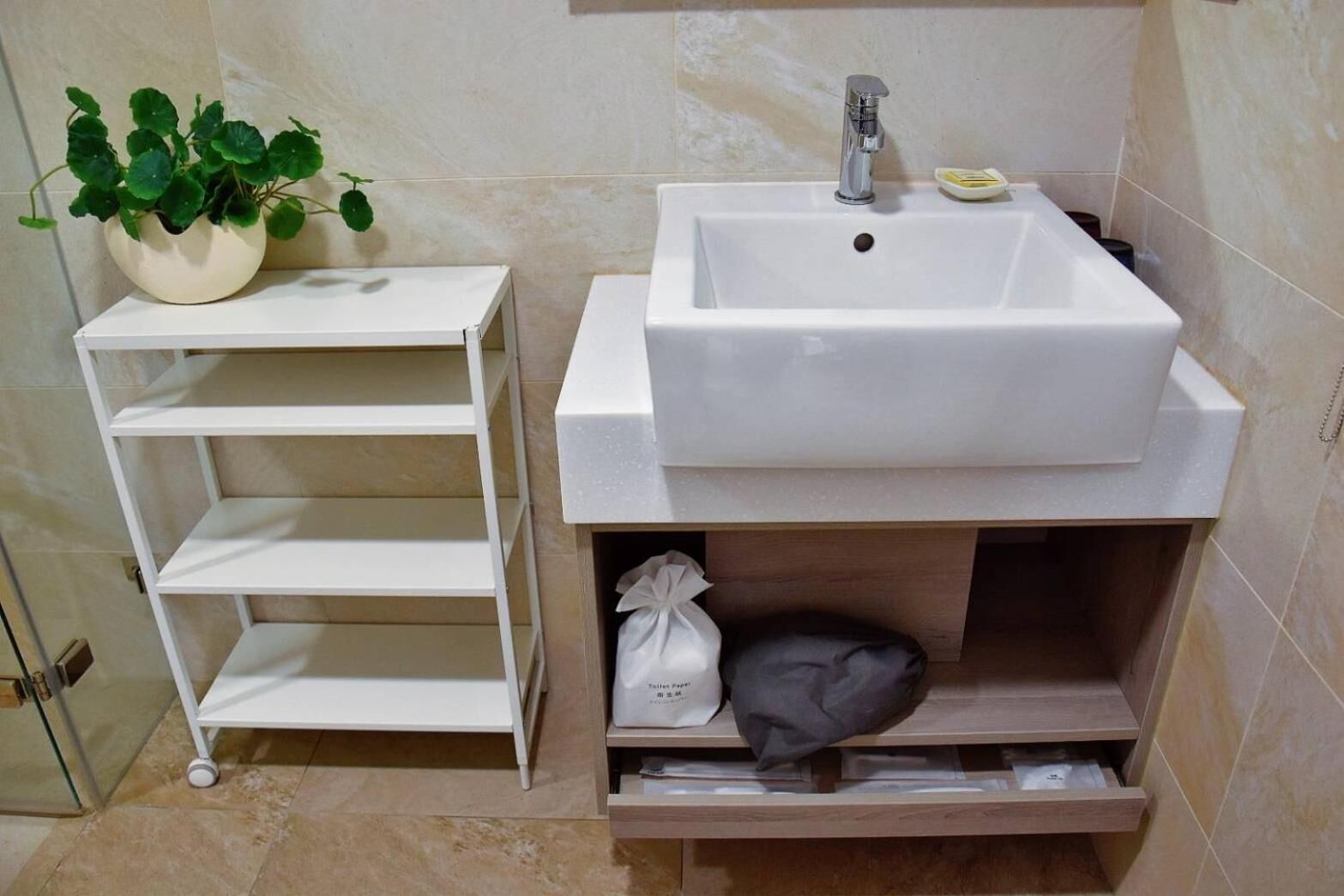 eco-friendly toiletries, hair dryer, slippers, towels