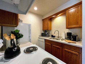 Fridge, microwave, dishwasher, coffee/tea maker