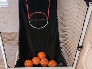 A basketball hoop with a net, a basketball hoop with a net, and a basketball hoop with a net. - Spacious Holiday Home in Glesborg near Ocean (Glesborg)