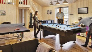 A pool table in a room with wooden walls and a staircase. - Spacious Holiday Home in Glesborg near Ocean (Glesborg)