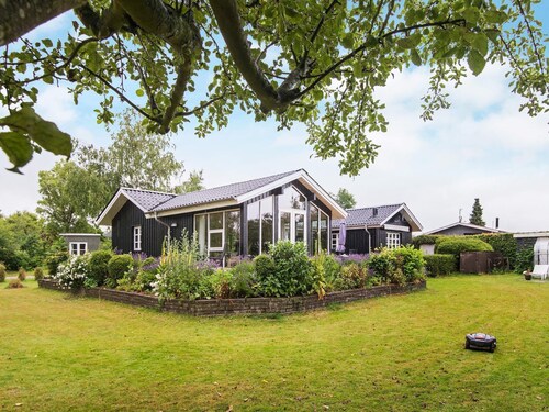 Vintage Holiday Home in Rønde Amidst Greenery