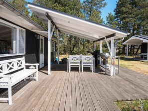 Outdoor dining - 4 Person Holiday Home in Norre Nebel (Norre Nebel)