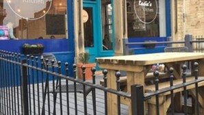A restaurant named 'Eddie's Kitchen' with a blue facade and a number '74' above the entrance. - Albert Rd (Colne)