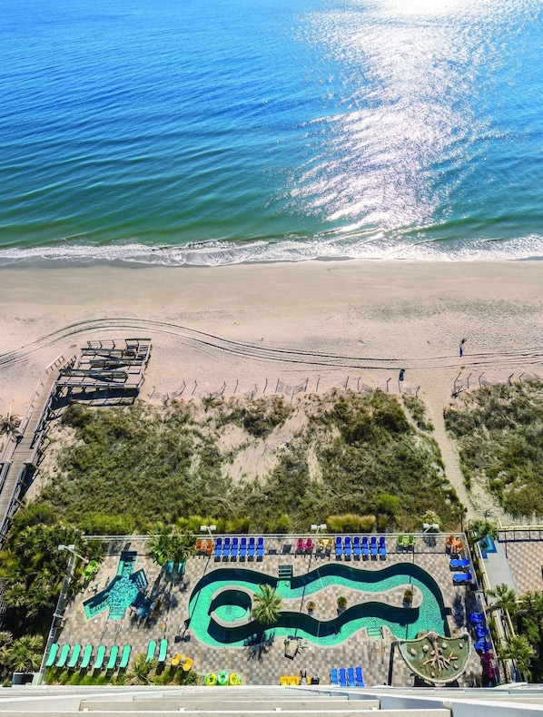 On the beach, sun-loungers, beach towels