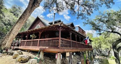 Cozy and secluded Log Cabin near the Frio River with a private pool!