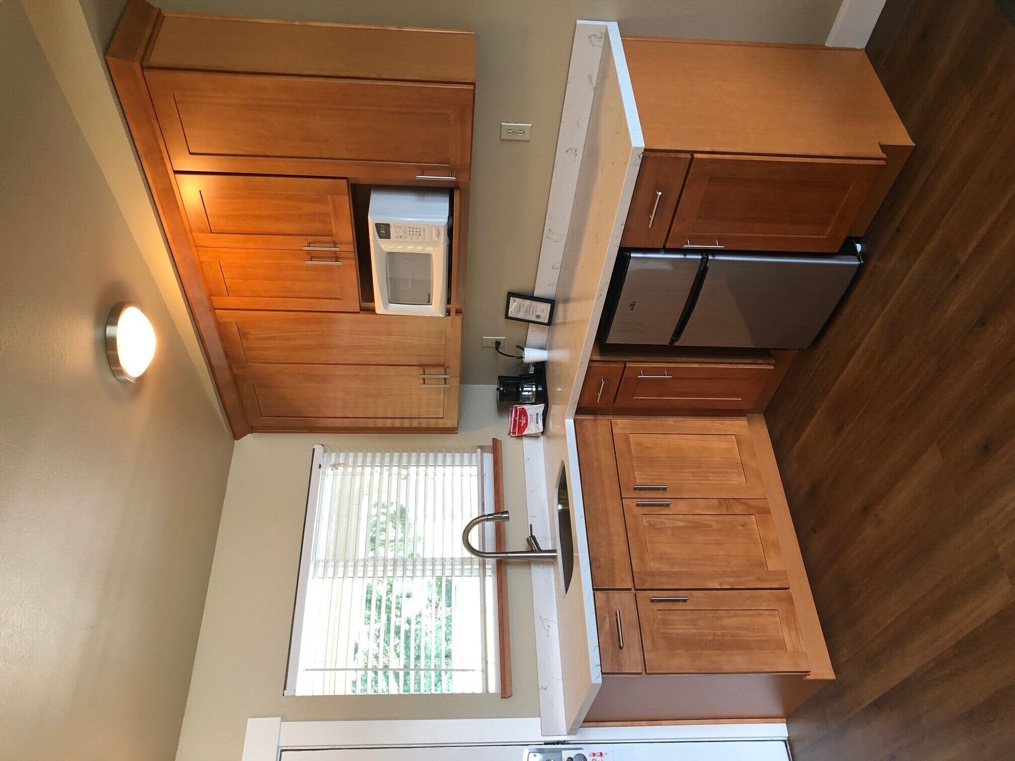 orca king room with sunset deck | private kitchenette | coffee/tea maker