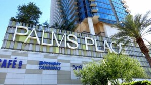 A building with the sign "PALMS PLACE" and a café named "BODYWHEAT TANNING" below it. - Strip View! Luxurious Studio at Palms Place - 10 (Las Vegas)