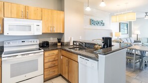 Coffee/tea maker, fridge, microwave, oven