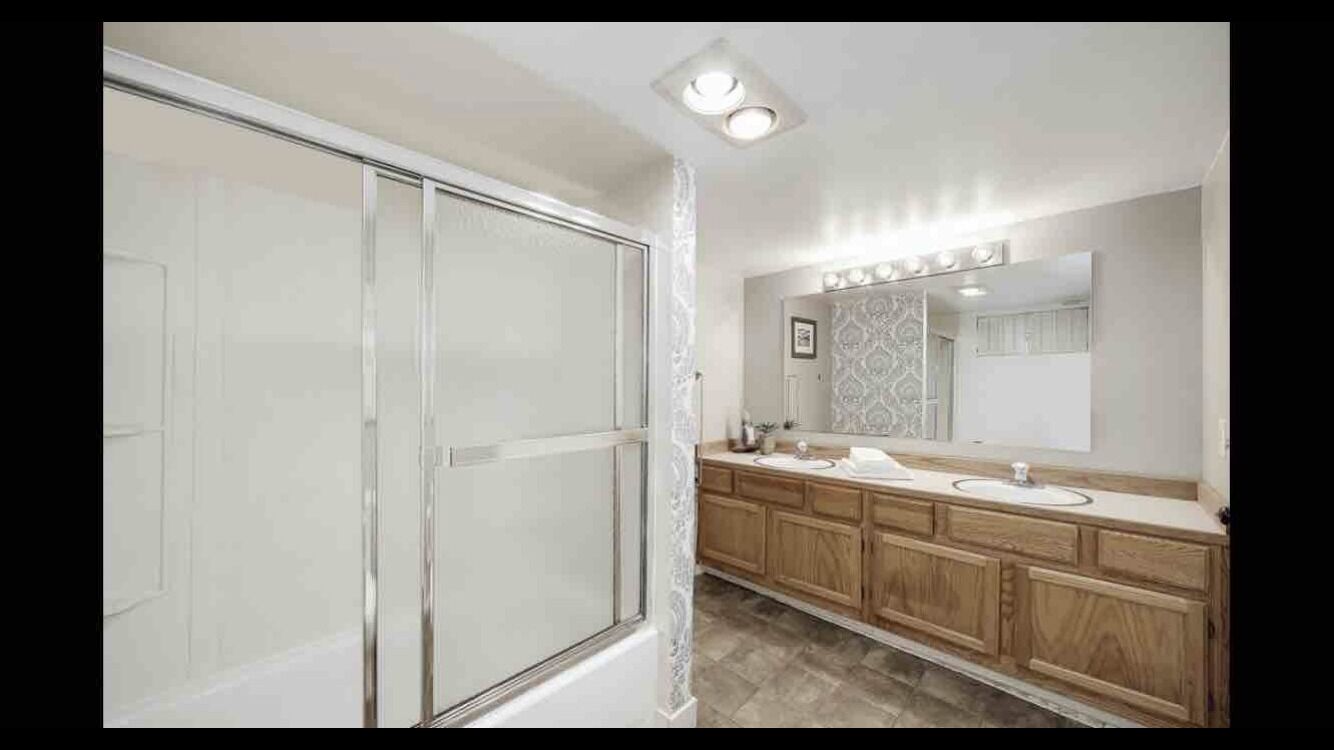 Combined shower/tub, hair dryer, towels, soap