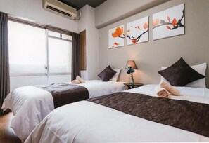 Twin Room, Non Smoking | Soundproofing, iron/ironing board, free WiFi, bed sheets - Sakura Sands Hotel (Osaka)