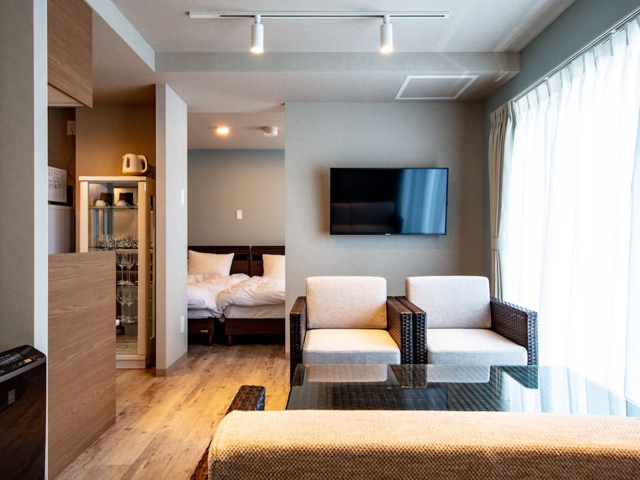 Standard Quadruple Room | Living area | 37-inch LCD TV with digital channels, TV