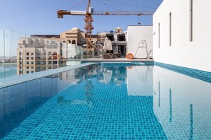 Outdoor pool - Alluring 1BR Apartment - Near the Beach! (Dubai)