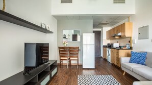 Living area - Chic & Timeless Studio Apartment in The Heart of Sports City (Dubai)