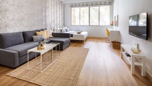 Laptop workspace, iron/ironing board, Internet, bed sheets - Bright & Rustic Studio In Lake Apartments (Dubai)
