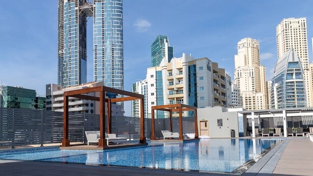Pool - Exquisitely Designed 1BR Apartment in Dazzling Dubai Marina! (Dubai)