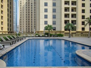 Outdoor pool - Elegant 2BR in JBR With Stunning Marina Views! (Dubai)