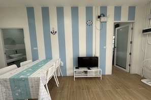 Casa, 2 quartos | Escrivaninha, Wi-Fi de cortesia, roupa de cama