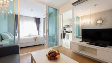 Apartamento | Área de estar | TV