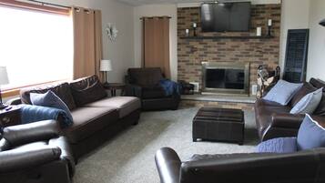 Smart TV, fireplace, books