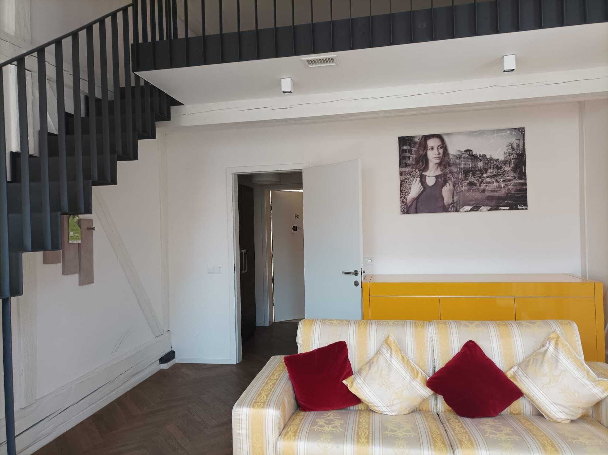 duplex family suite | living area | flat-screen tv