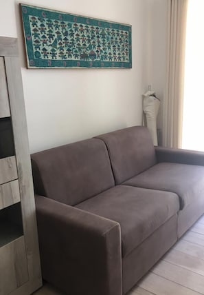 Apartment, 1 Bedroom | Living area | Flat-screen TV