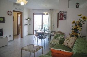 Apartment, 2 Bedrooms | Living area - Casa Astice (Alghero)