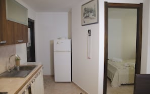 Apartment, 2 Bedrooms | Private kitchen | Full-sized fridge, microwave, oven, stovetop