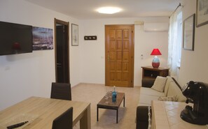 Apartment, 2 Bedrooms | Living area | Flat-screen TV - Casa Valverde (Alghero)
