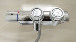 A chrome faucet with a flexible hose attached, indicating a water source. - MARE HOUSE-1F (Tokyo)