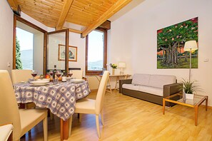 Family Apartment, Multiple Bedrooms (Appartamento Villa Lina) | Dining - Appartamento Villa Lina (Riva del Garda)