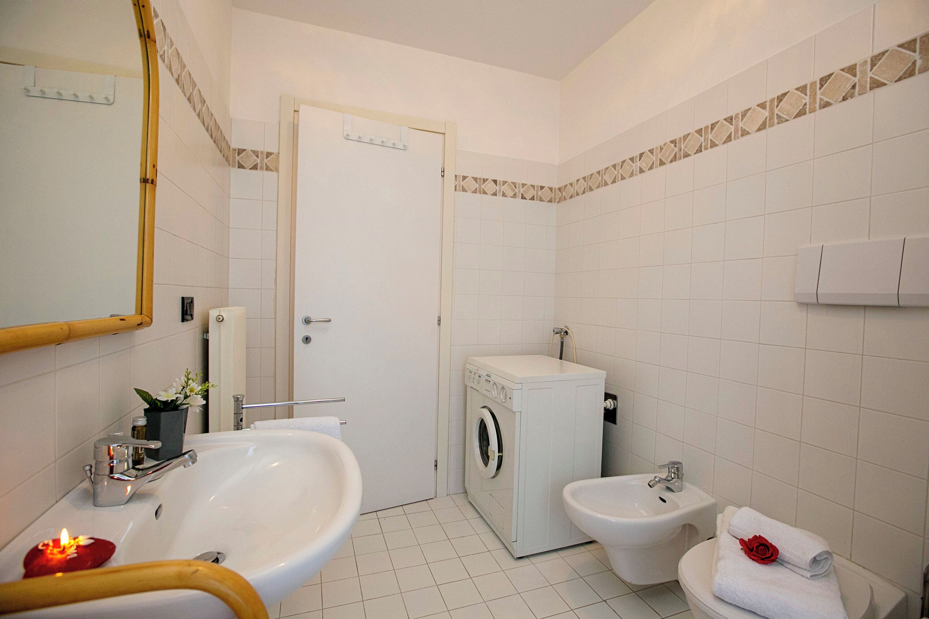 Family Apartment, Multiple Bedrooms (Appartamento Lara) | Bathroom | Shower, rainfall showerhead, hair dryer, bidet