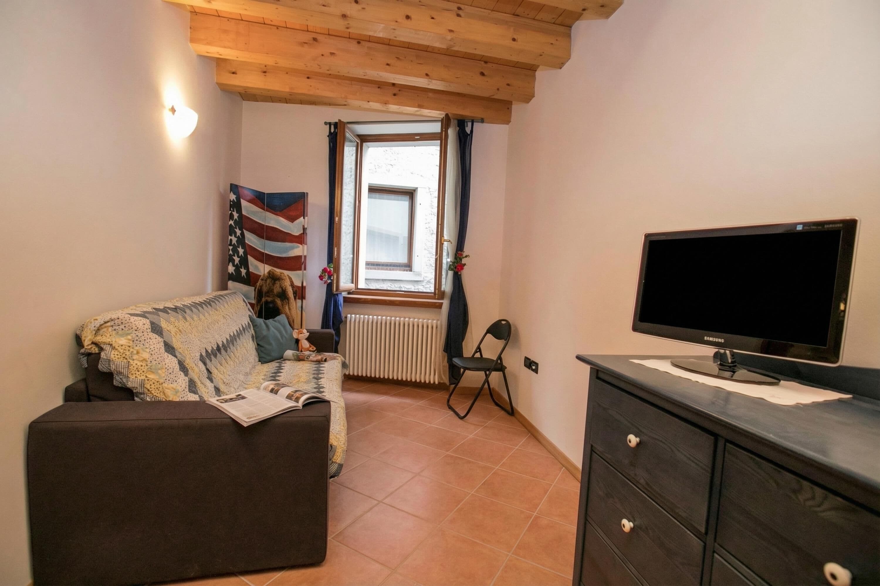 Family Apartment, Multiple Bedrooms (Appartamento Centro Storico Riva) | Living area | Flat-screen TV