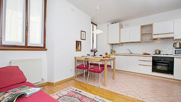 Family Apartment, Multiple Bedrooms, Lakeside (Appartamento Centro Storico Riva 2) | Living area | Flat-screen TV