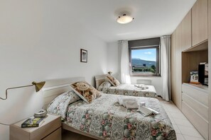Appartement familial, plusieurs chambres (Appartamento Amy) | 2 chambres, fer et planche à repasser, accès au Wi-Fi (inclus)