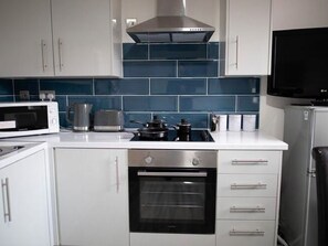 Apartment | Private kitchen | Fridge, microwave, oven, electric kettle