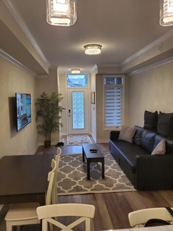 Full view of living room and dining room.