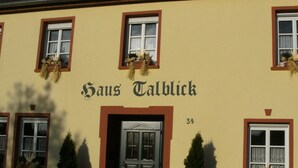 A building with the name "Haus Talblick" and the number 34. - Cozy Morbach Getaway (Morbach)