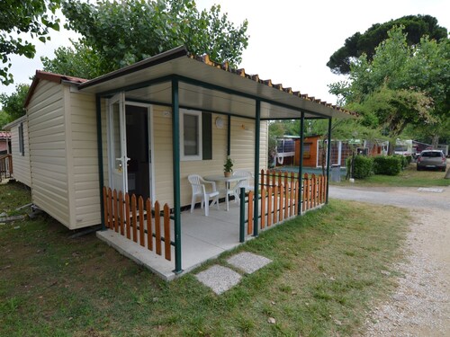 Wooden Chalet with Terrace near Beach