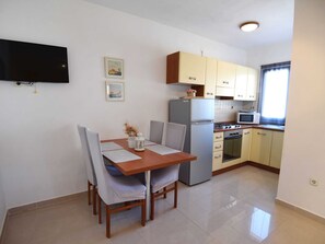 Appartement | Cuisine privée | Chaise haute