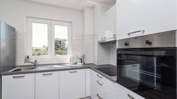 Apartment | Private kitchen | Highchair, cookware/dishes/utensils