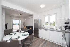 Apartment | Private kitchen | Highchair, cookware/dishes/utensils