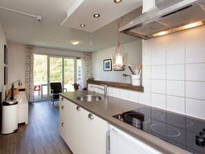 Apartment | Private kitchen | Fridge, microwave, coffee/tea maker, highchair - Apartment in Hollum Near the Sea (Hollum)