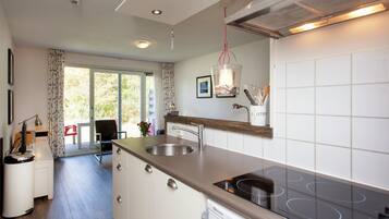 Apartment | Private kitchen | Fridge, microwave, coffee/tea maker, high chair