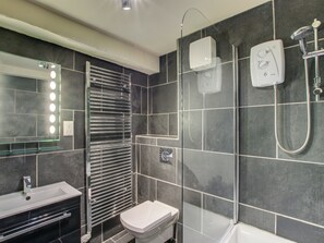 Ducha y bañera combinadas y toallas