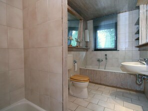 Combined shower/tub