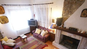 House | Living room | Fireplace - Modern Holiday Home in Spello With Private Pool (Spello)